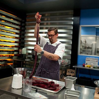 Cosentino, making blood sausages on <em>Top Chef Masters.</em>