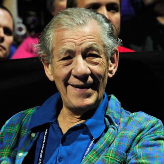 British actor Ian Mckellen watches Switzerland's Roger Federer play against Argentina's Juan Martin Del Potro during their group B singles match in the round robin stage on the sixth day of the ATP World Tour Finals tennis tournament in London on November 10, 2012.