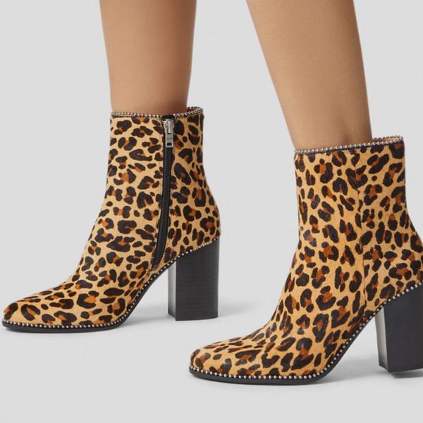The zip up leopard print Coach Drea Boot with silver stud accents and a black block heel. The Strategist - 48 Things on Sale You’ll Actually Want to Buy: From Sunday Riley to Patagonia