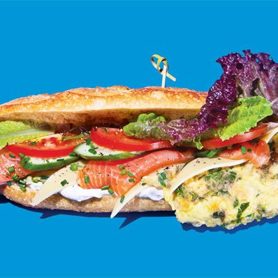 Breads Bakery’s Frittata Sandwich
$14.95; 18 E. 16th St., nr. Union Sq. W.; 212-633-2253
Tel Aviv–born baker Uri Scheft plops an herby Italian omelette on a foot-long baguette and calls it a frittata sandwich. We like to think of it as an Israeli hero. Ask for it with the works and you get lettuce, tomato, cucumber, mild Gouda, cream cheese, smoked salmon, and a flurry of chives—the whole shebang held together with a bamboo toothpick.