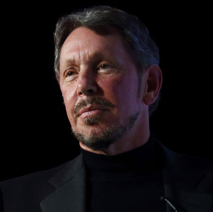 Larry Ellison, chief executive officer of Oracle Corp., gestures as he makes a speech at the New Economy Summit 2014 in Tokyo, Japan, on Wednesday, April 9, 2014. 