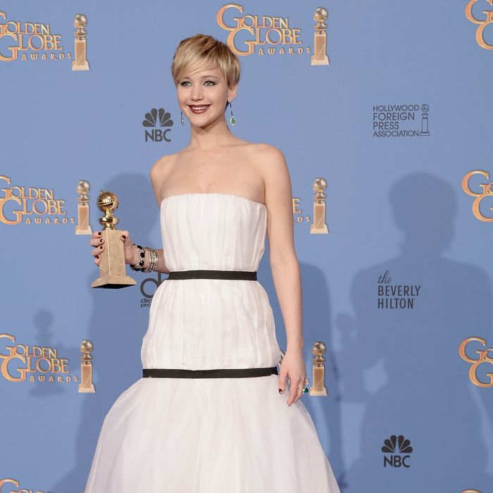 BEVERLY HILLS, CA - JANUARY 12: Actress Jennifer Lawrence, winner of Best Supporting Performance in a Motion Picture Drama, Musical or Comedy for 'American Hustle,' poses in the press room during the 71st Annual Golden Globe Awards held at The Beverly Hilton Hotel on January 12, 2014 in Beverly Hills, California. (Photo by Kevin Winter/Getty Images)