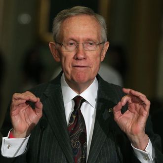 Senate Majority Leader Harry Reid (D-NV) speaks to the media on April 9, 2013 in Washington, DC. Leader Reid spoke briefly to reporters after attending the Democratic policy luncheon. 