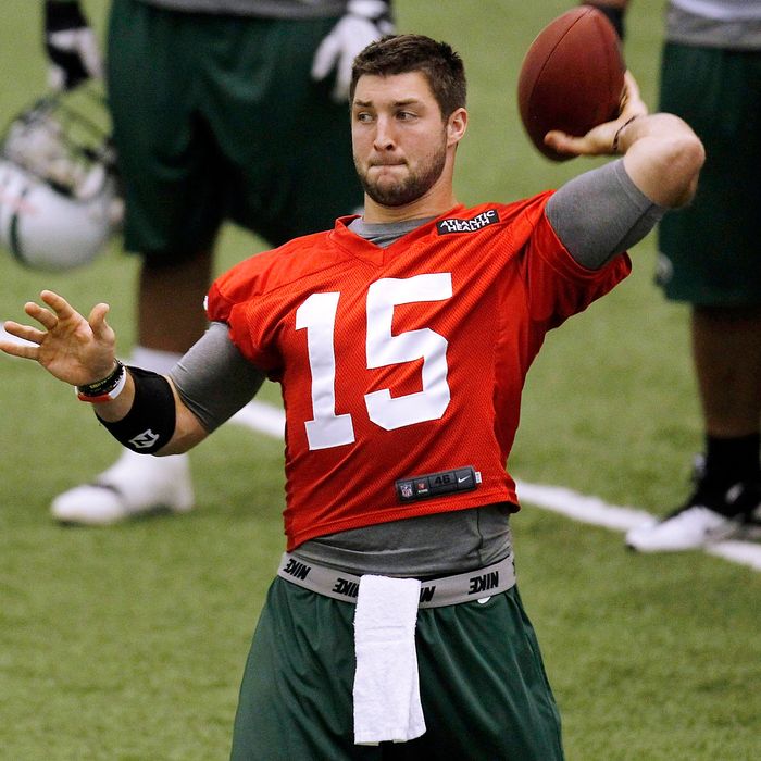 Tim Tebow #15 of the New York Jets works out during the first day of minicamp at the New York Jets Atlantic Health Training Center on June 12, 2012 in Florham Park, New Jersey.