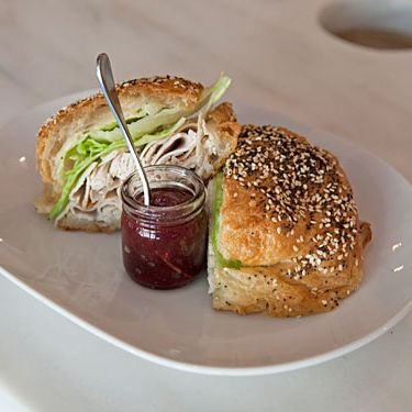 on an everything croissant with sage mayo