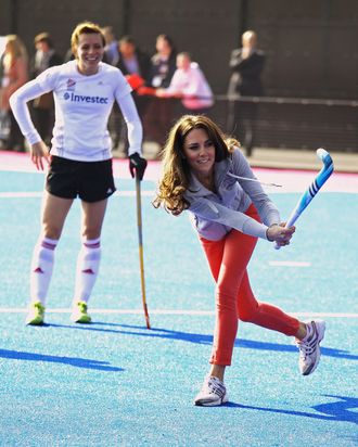 Women's Team GB hockey captain Kate Walsh watches Catherine, Duchess of Cambridge play hockey with the GB hockey teams at the Riverside Arena in the Olympic Park on March 15, 2012 in London, England. The Duchess of Cambridge viewed the Olympic park as well as meeting members of the men's and women's GB Hockey teams.