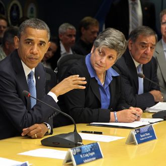 WASINGTON, DC - OCTOBER 31: U.S. President Barack Obama (L) speaks as Homeland Security Secretary Janet Napolitano (2nd L), U.S. Defense Secretary Leon Panetta (2nd R) and Housing and Housing and Urban Development Secretary Shaun Donovan.listen at FEMA headquarters abolut cleanup efforts in the wake of Hurricane Sandy Oct.ober 31, 2012 in in Washington, DC. Obama will be touring parts of storm ravavaged New Jersey later in the day. (Photo by Martin H. Simon-Pool/Getty Images)