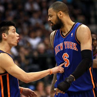 New York Knicks Tyson Chandler has his jersey pulled down while