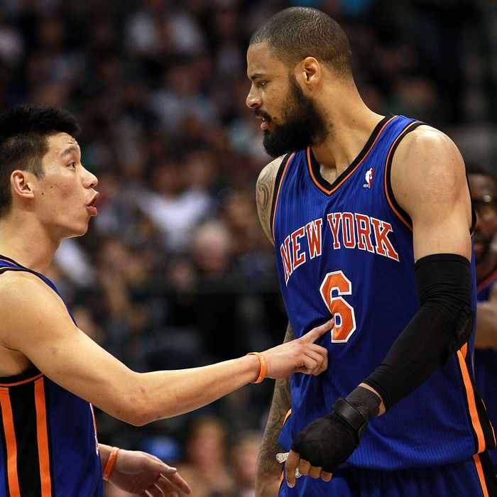  Jeremy Lin #17 of the New York Knicks talks with Tyson Chandler #6 during play against the Dallas Mavericks at American Airlines Center