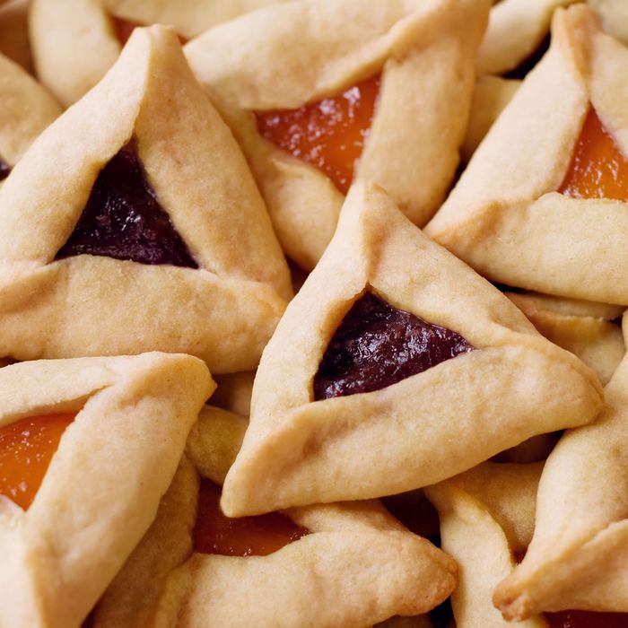 An expansive pile of apricot and prune hamantaschen