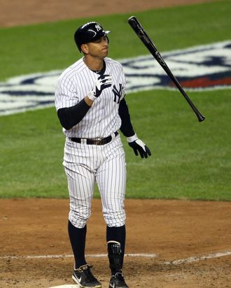 Alex Rodriguez #13 of the New York Yankees reacts after striking out during Game Four of the American League Division Series against the Baltimore Orioles at Yankee Stadium on October 11, 2012 in the Bronx borough of New York City. 
