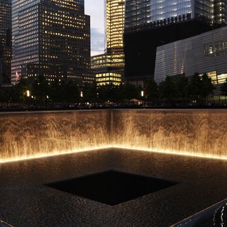 NEW YORK, NY - MAY 30: The 9/11 Memorial is viewed during a ceremony for recovery workers and first responders on the10-year anniversary of the formal end of cleanup operations at Ground Zero on May 30, 2012 in New York City. Thousands of men and women came to Ground Zero following the September 11, 2001 terrorist attacks to help with the recovery effort. Numerous first responders, including police and fire fighters, have subsequently been plagued with health issues many believe are related to the air they breathed in the weeks and months following the attacks. The nine-month recovery effort at the site ended May 30, 2002. (Photo by Spencer Platt/Getty Images)