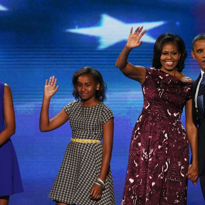 CHARLOTTE, NC - SEPTEMBER 06: Democratic presidential candidate, U.S. President Barack Obama stands on stage with (L-R) Malia Obama, Sasha Obama and First lady Michelle Obama after accepting the nomination during the final day of the Democratic National Convention at Time Warner Cable Arena on September 6, 2012 in Charlotte, North Carolina. The DNC, which concludes today, nominated U.S. President Barack Obama as the Democratic presidential candidate. (Photo by Alex Wong/Getty Images)