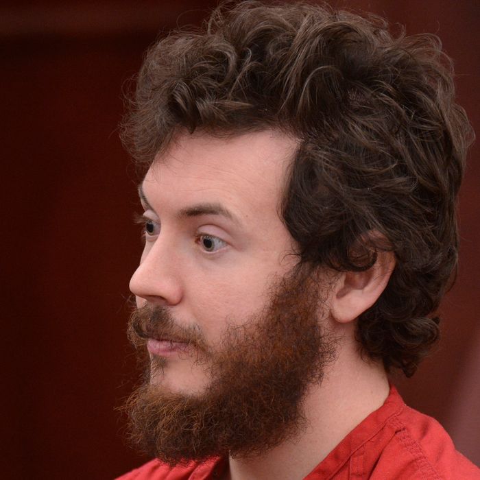 James Holmes, Aurora theater shooting suspect, sits in the courtroom during his arraignment in Centennial, Colo., on Tuesday, March 12, 2013. Judge William Blair Sylvester entered a not guilty plea on behalf of James Holmes on Tuesday after the former graduate student's defense team said he was not ready to enter one. 