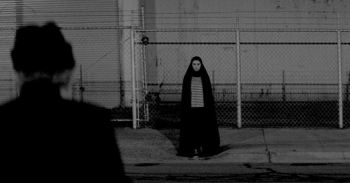 woman walking alone at night