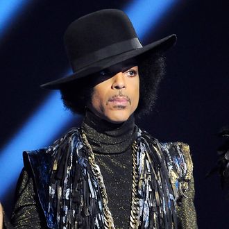 LONDON, ENGLAND - FEBRUARY 19: Prince presents the award for British Female Solo Artist at The BRIT Awards 2014 at 02 Arena on February 19, 2014 in London, England. (Photo by Matt Kent/WireImage)