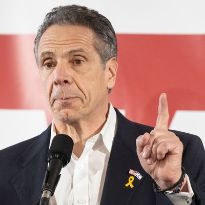 Andrew Cuomo speaks during a rally with members of District