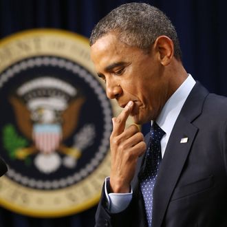 U.S. President Barack Obama delivers remarks about the fiscal cliff negotiations in the Eisenhower Executive Office Building next to the White House December 31, 2012 in Washington, DC. Obama said he was hopeful that an agreement could be found to avert the fiscal cliff in Congress, which is closing in on a deal that would raise taxes on households that make more than $450,000 a year and individuals who make more than $400,000.