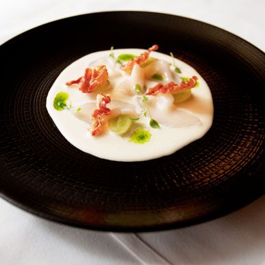 Cured Scallops: Citrus salt-cured scallops, ajo blanco, green grapes, and crispy Serrano ham.