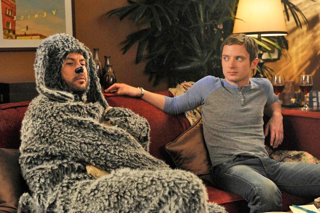 WILFRED: L-R: Jason Gann and Elijah Wood in the WILFRED episode &quot;Conscience&quot; (Airs July 28, 10:00 pm e/p) on FX. CR: Ray Mickshaw / FX.