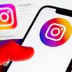 In this photo illustration, an Instagram logo seen displayed