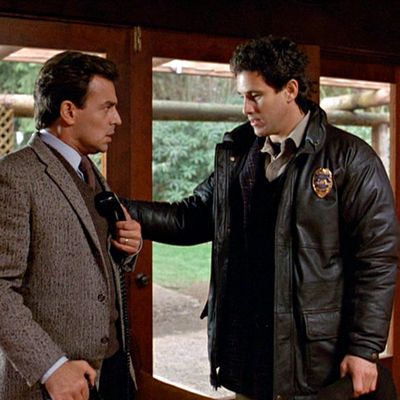 TWIN PEAKS. Ray Wise as Leland Palmer and Michael Ontkean as Sheriff Harry S. Truman in the pilot episode. Originally aired April 8, 1990. Copyright ?1990 CBS Broadcasting Inc. All Rights Reserved. Credit: CBS Photo Archive. Image is a framegrab.