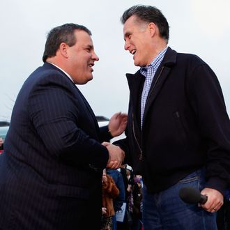 WEST DES MOINES, IA - DECEMBER 30: Former Massachusetts Governor and Republican presidential candidate Mitt Romney (R) shakes hands with New Jersey Governor Chris Christie during a campaign rally at a Hy Vee supermarket December 30, 2011 in West Des Moines, Iowa. Christie, a popular Republican governor who was urged to run for president earlier this year, appeared with Romney just days before the 