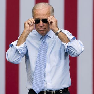 US Vice President Joe Biden takes his sunglasses off as he arrives for a campaign event with President Barack Obama at Strawbery Banke Field in Portsmouth, New Hampshire, September 7, 2012.