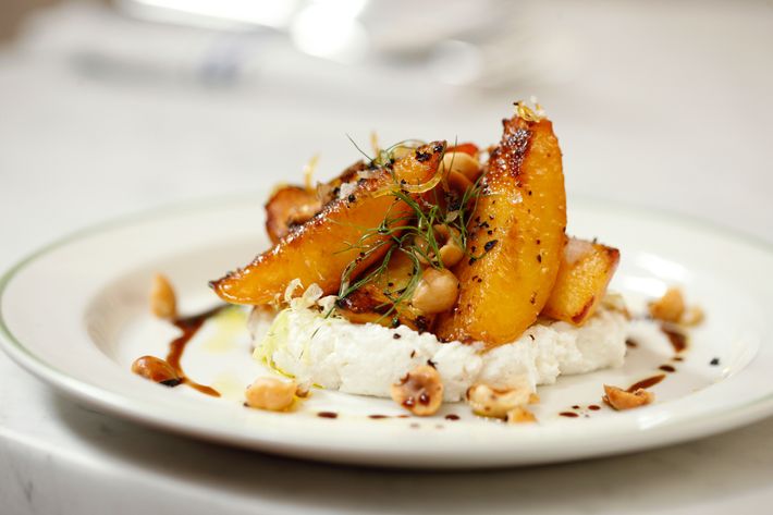 Pesche: charred peaches, sheep's milk ricotta, candied lemon zest, hazelnuts.