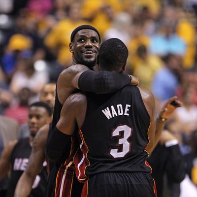 LeBron James #6 of the Miami Heat hugs teammate Dwyane Wade #3 near the end of a win over the Indiana Pacers in Game Four of the Eastern Conference Semifinals in the 2012 NBA Playoffs at Bankers Life Fieldhouse on May 20, 2012 in Indianapolis, Indiana. The Heat defeated the Pacers 101-93.