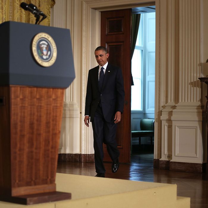 U.S. President Barack Obama approaches the podium to make a statement on the situation regarding the Internal Revenue Service May 15, 2013 at the East Room of the White House in Washington, DC. Obama had a meeting with Senior Treasury Officials, including Treasury Secretary Jack Lew via telephone, on the situation regarding the Internal Revenue Service.