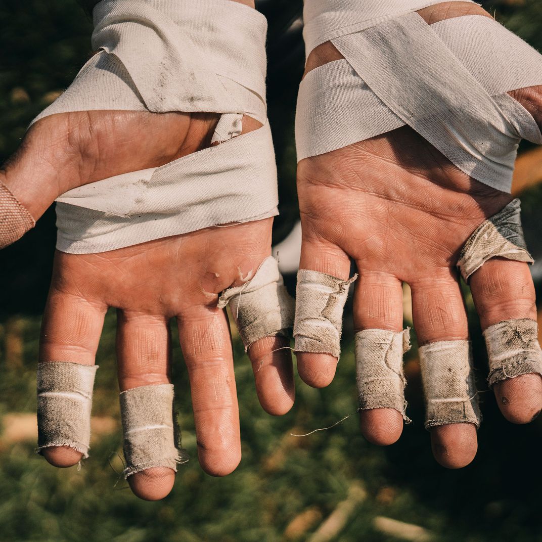 <p>Philip Voyer, his hands defended against blisters.</p>