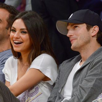 LOS ANGELES, CA - FEBRUARY 12: Mila Kunis (L) and Ashton Kutcher attend a basketball game between the Phoenix Suns and the Los Angeles Lakers at Staples Center on February 12, 2013 in Los Angeles, California. (Photo by Noel Vasquez/Getty Images)