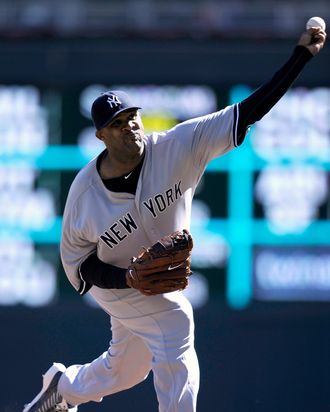 MINNEAPOLIS, MN - SEPTEMBER 26: CC Sabathia #52 of the New York Yankees delivers a pitch against the Minnesota Twins during the first inning of the game on September 26, 2012 at Target Field in Minneapolis, Minnesota. (Photo by Hannah Foslien/Getty Images)