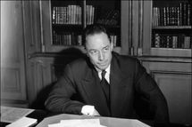 TO GO WITH STORY BY JEAN-MICHEL STOULLIG
(FILES) A picture taken on October 17, 1957 shows French writer Albert Camus posing for a portrait in Paris following the announcement that he is being awarded the Noel Prize for literature. French and Algerian experts have joined together to trace the steps of Albert Camus in his birthplace in Algeria, where 50 years after his death he raises both pride and political suspiscion. AFP PHOTO/- (Photo credit should read -/AFP/Getty Images)