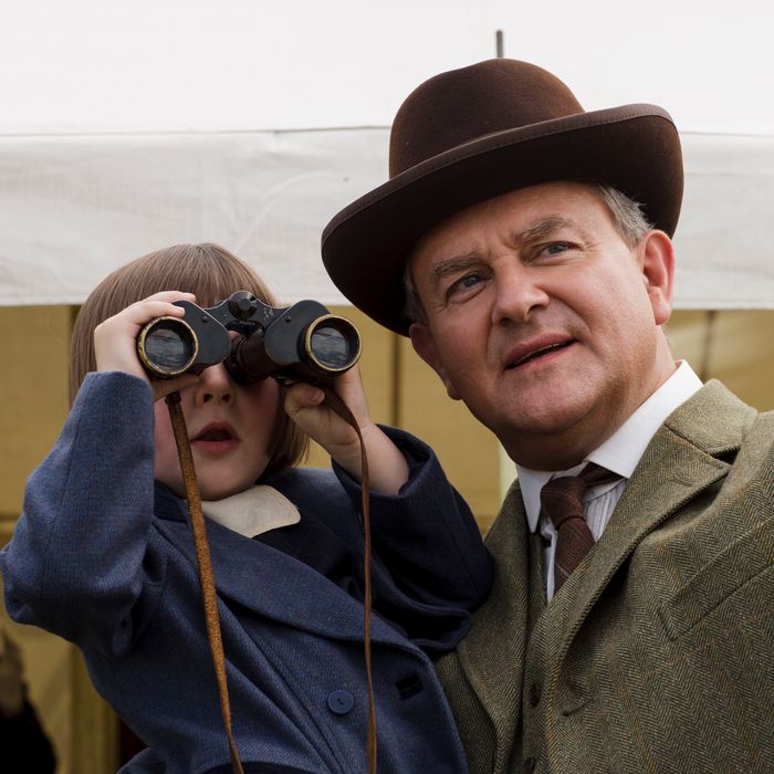 Downton Abbey Season 5 on MASTERPIECE on PBSPart SixSunday, February 8, 2015 at 9pm ETAn ancient spark flares in Violet’s heart. While police deepen their probe, Bates tells Anna thetruth. A long and painful mystery is solved.Shown from left to right: Fifi Hart as Sybbie Branson and Hugh Bonneville as Lord Grantham(C) Nick Briggs/Carnival Films 2014 for MASTERPIECEThis image may be used only in the direct promotion of MASTERPIECE CLASSIC. No other rights are granted. All rights are reserved. Editorial use only. USE ON THIRD PARTY SITES SUCH AS FACEBOOK AND TWITTER IS NOT ALLOWED.