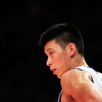 Jeremy Lin #17 of the New York Knicks looks on against the Sacramento Kings at Madison Square Garden on February 15, 2012 in New York City.