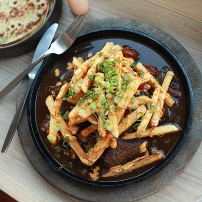 The lomo saltado, or beef tenderloin stir-fry, with scallion pancakes.