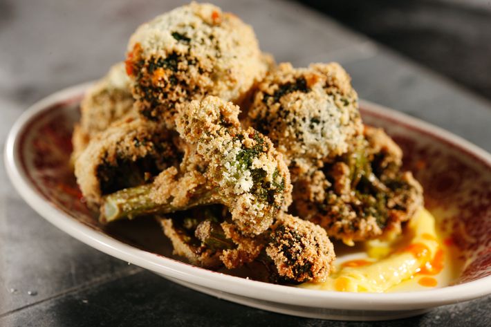 This surprisingly delicious dish includes lemon curd, housemade hot sauce, and broccoli that is marinated overnight in buttermilk, dipped in semolina flour, and then fried.