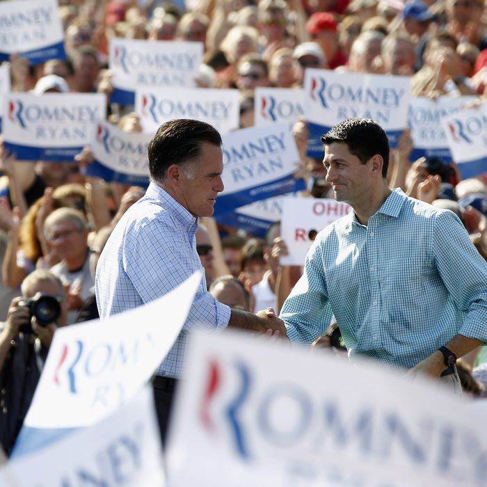 COLUMBUS GROVE, OH - AUGUST 25: Presumptive Republican presidential nominee, former Massachusetts Governor Mitt Romney, and Vice Presidential running mate U.S. Rep. Paul Ryan (R-WI) attend a rally with supporters on August 25, 2012 in Columbus Grove, Ohio. Romney and Ryan are campaigning together leading up to the Republican National Convention beginning August 27 in Tampa, Florida. (Photo by Matt Sullivan/Getty Images)