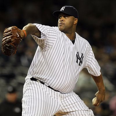 NEW YORK, NY - SEPTEMBER 21: CC Sabathia #52 of the New York Yankees pitches against the Tampa Bay Rays on September 21, 2011 at Yankee Stadium in the Bronx borough of New York City. (Photo by Jim McIsaac/Getty Images)