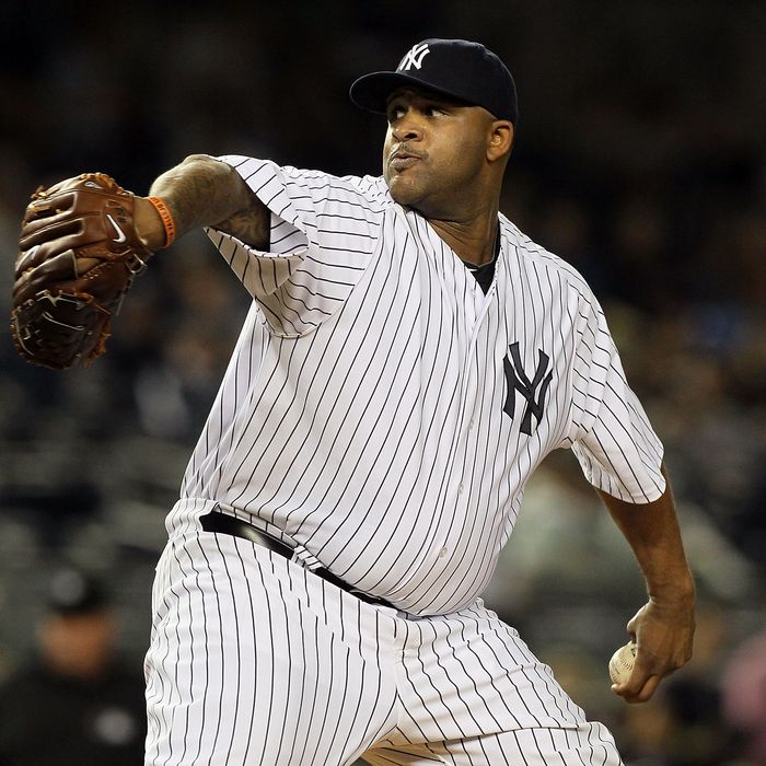 NEW YORK, NY - SEPTEMBER 21: CC Sabathia #52 of the New York Yankees pitches against the Tampa Bay Rays on September 21, 2011 at Yankee Stadium in the Bronx borough of New York City. (Photo by Jim McIsaac/Getty Images)