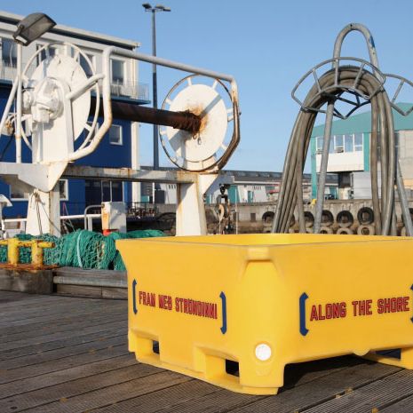 Launching of Lawrence Weiner's commercial fishing bins on the occasion of his solo exhibition "Along the Shore" at i8 Gallery, 2014.