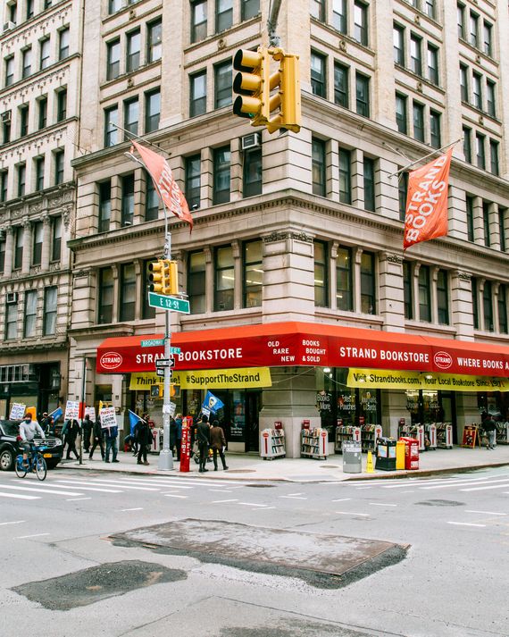 Current and former union members protest the Strand on March 1.