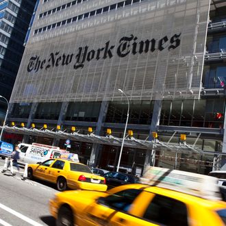 NEW YORK - APRIL 21: Traffic moves along by The New York Times headquarters building April 21, 2011 in New York City. The New York Times profits fell 58 percent in the first quarter of 2011. (Photo by Ramin Talaie/Getty Images)