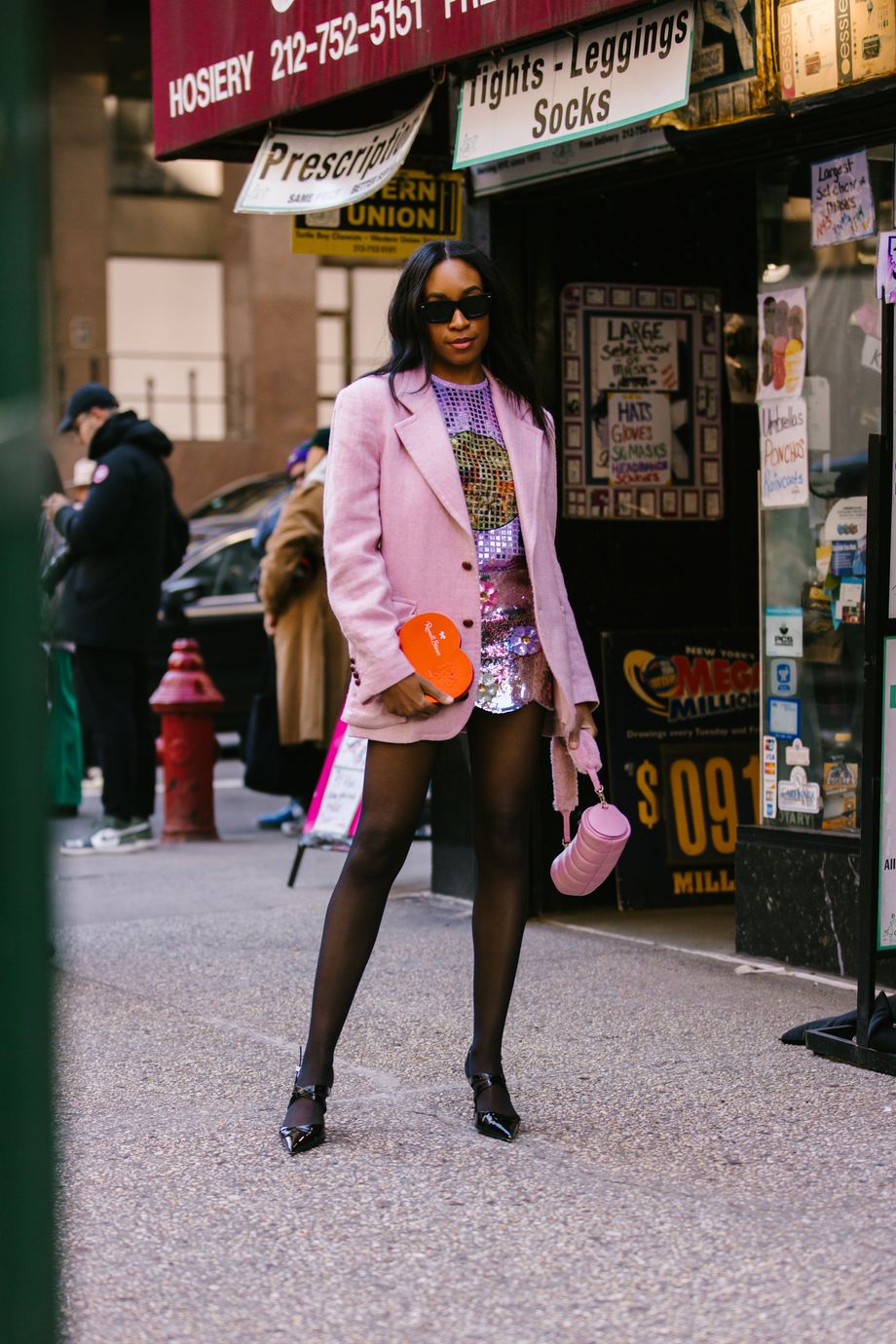 Woman with pink fur coat and brown Louis Vuitton bag before John Richmond  fashion show, Milan Fashion Week street style – Stock Editorial Photo ©  AndreaA. #272372864