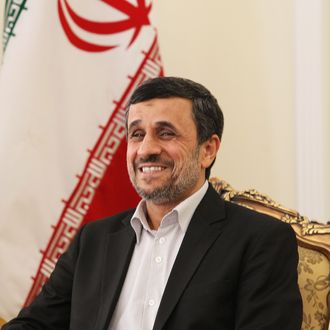 Iran's President Mahmoud Ahmadinejad smiles as he meets his Pakistanese counterpart during a meeting on February 27, 2013 in the Iranian capital Tehran. Pakistan's president arrived in Tehran for discussions on a much-delayed $7.5 billion gas pipeline project which is opposed by the United States, Iranian media reported.
