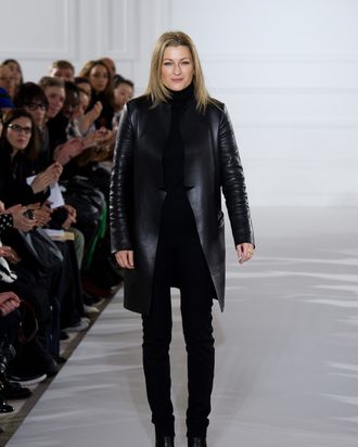 Designer Joanna Sykes appears on the runway after the Aquascutum show at London Fashion Week Autumn/Winter 2012 at The Savoy Hotel on February 18, 2012 in London, England.