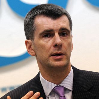Russian metals tycoon and US basketball team owner Mikhail Prokhorov gives a news conference in Moscow on December 12, 2011 to announce that he intended to challenge Prime Minister Vladimir Putin in next year's presidential elections.