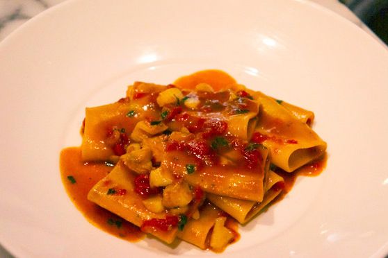Paccheri all'Amalfitana
Delfina, San Francisco
3621 18th Street
415.552.4055; $19
James Beard Award-winning chef Craig Stoll says you can find dishes of the large tubular paccheri pasta like this, in various seafood ragus, up and down the Western coast of Italy. Stoll's version, made with true cod and a rich, wine-y tomato sauce with seafood stock as its base, is as good as any you'd have in Amalfi, we'd wager.